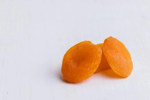 Dried peach on white table Stock Photos