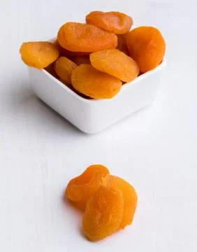 Dried peach on white table Stock Photos