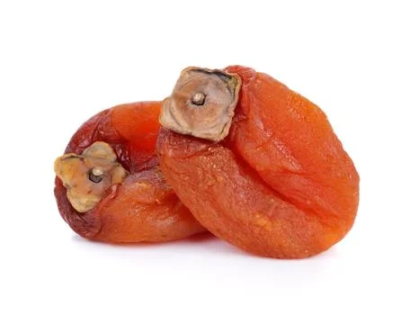 Dried persimmon on white background Stock Photos