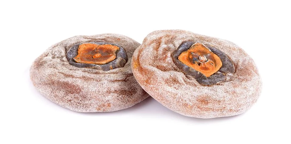 Dried persimmon on white background Stock Photos