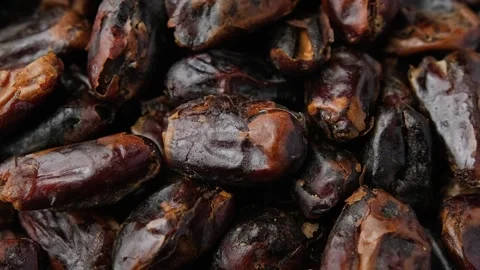 Dried pitted sweet dates, rotating video Stock Footage 303235672