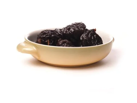 Dried plum on white Stock Photos