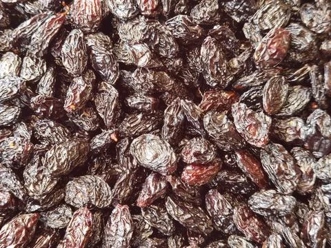 Dried plums in bulk but isolated Stock Photos