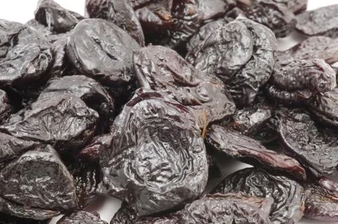 Dried prunes macro Stock Photos