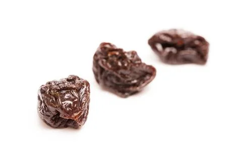 Dried Prunes on a White Background Stock Photos