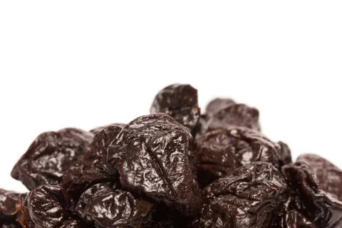 Dried Prunes on a White Background Stock Photos