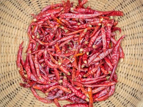 Dried red chilli pepper in basket weave Stock Photos