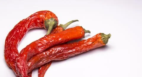 Dried red chilli peppers Stock Photos