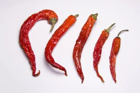 Dried red chilli peppers Stock Photos
