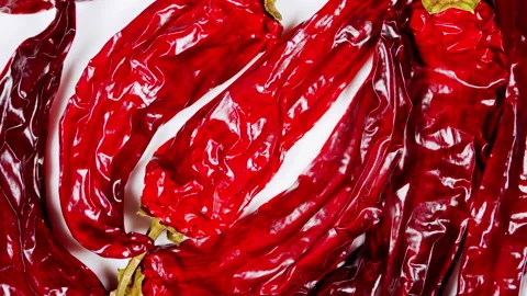 Dried red chilli on white background. Spicy food concept. Video stock 165049136