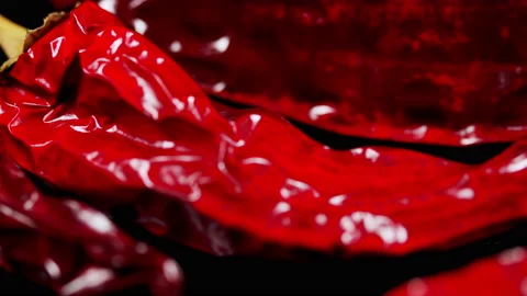 Dried red chilly peppers on dark background. Red pepper harvest. Stock Footage 165761603