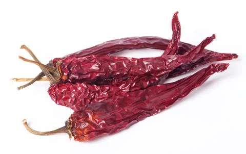 Dried red peppers on white background Stock Photos