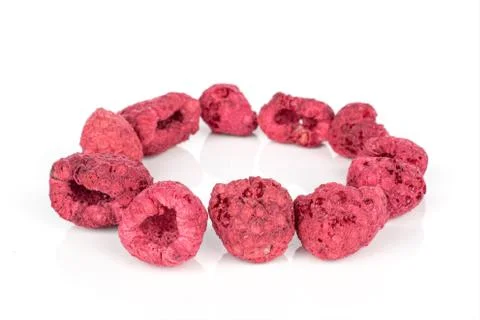Dried red raspberry isolated on white Foto stock