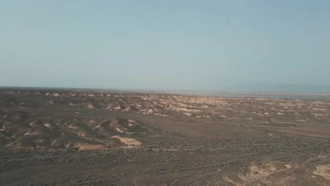 Dried up river bed in a desert area Video stock 239643721