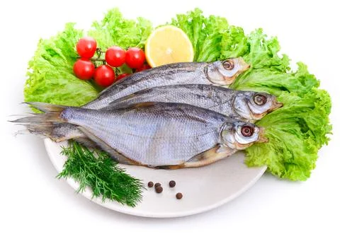 Dried roach ( Rutilus rutilus ) on a plate Stock Photos