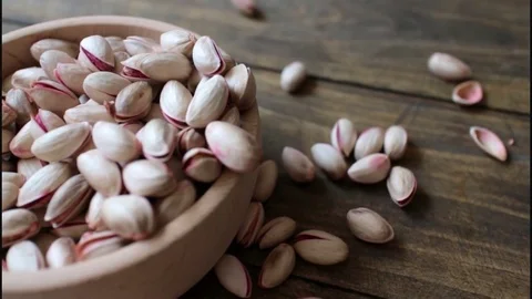 Dried roasted salted appetizing pistachios Stock Footage 73621285