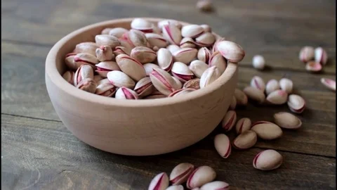 Dried roasted salted appetizing pistachios Stock Footage 73621298