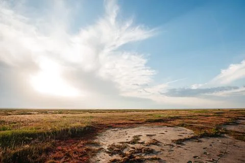 The dried-up salt lake of Ebeyty turned into a desert Stock Photos