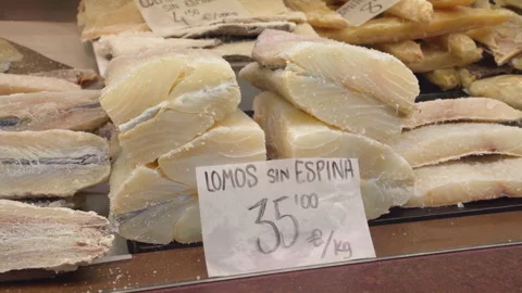 Dried salted cod loins on a counter of a central market (Mercado Central) Stock Footage 242083729