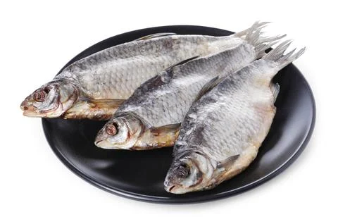 Dried salted roach fish isolated on white Stock Photos