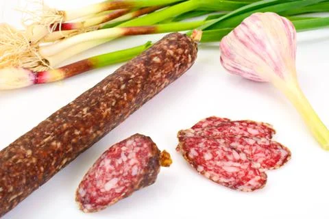 Dried Sausage on a Light Background Stock Photos