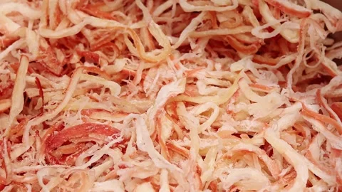 Dried shredded squid close up texture background Stock Footage 336663253
