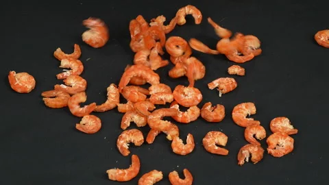 Dried Shrimp Falling Down On Black Background Slow Motion 스톡 동영상 337779137