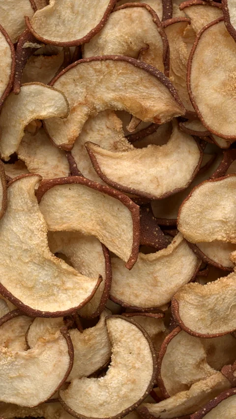 Dried sliced Asian pears background texture. Vertical video. Stock Footage 297620412