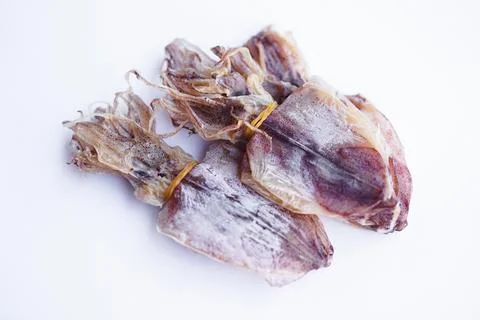Dried squids on white background Stock Photos