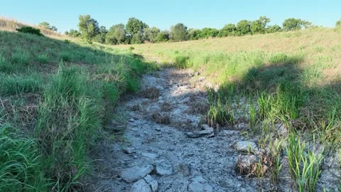 Dried stream drought river dry shallow waterway creek climate change Stock Footage 342390629
