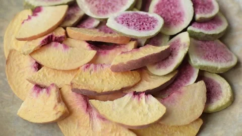 Dried sublimated fig and peach slices as an ingredient for desserts. Dried figs  Stock Footage 318613959