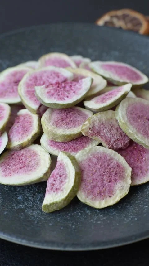 Dried sublimated fig slices as an ingredient for sweet desserts. Dried figs Stock Footage 318613909
