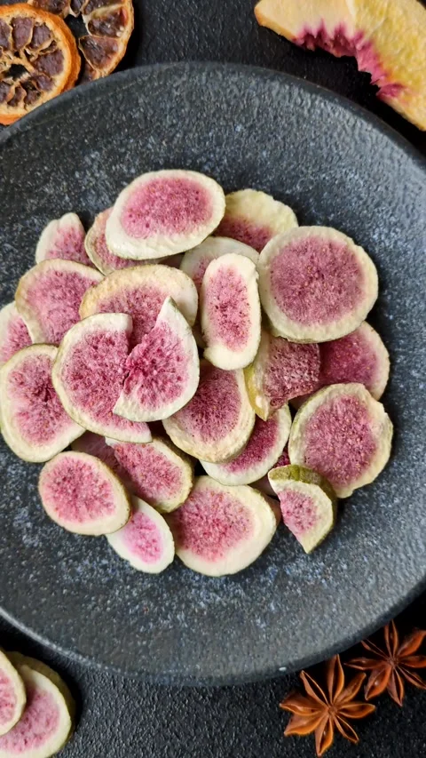 Dried sublimated fig slices as an ingredient for sweet desserts. Dried figs Stock Footage 318614006