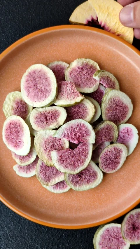 Dried sublimated fig slices as an ingredient for sweet desserts. Dried figs Stock Footage 318614021
