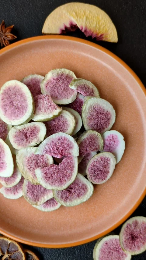 Dried sublimated fig slices as an ingredient for sweet desserts. Dried figs Stock Footage 318614023