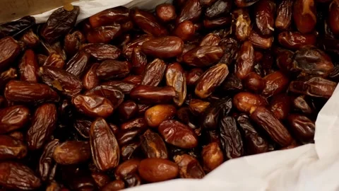 Dried sweet dates close up. Date fruit are in a box a lot of dates harvested. Hi Stock Footage 265856412