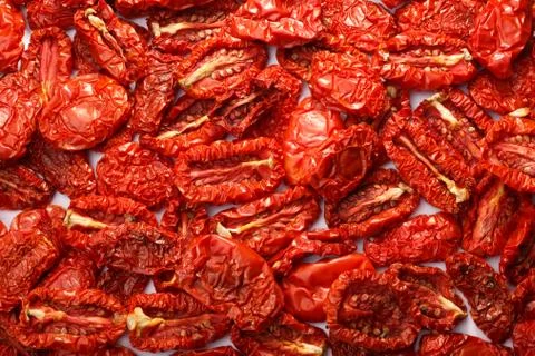 Dried tomatoes background, top view Stock Photos