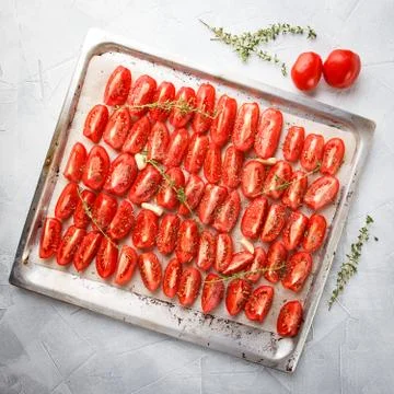 Dried tomatoes in baking tray Stock Photos