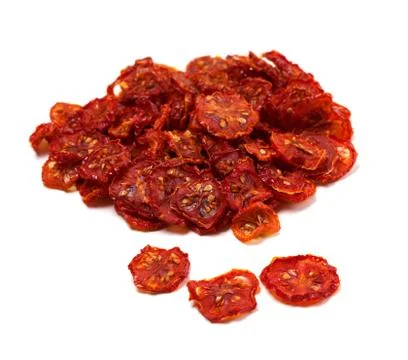 Dried tomatoes on white background. Stock Photos
