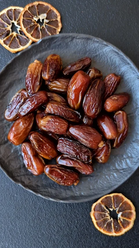 Dried tropical date fruit as an ingredient for fresh organic diet food Stock Footage 306006685