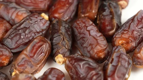 Dried turkish dates isolated on white plate background Stock Footage 238992666