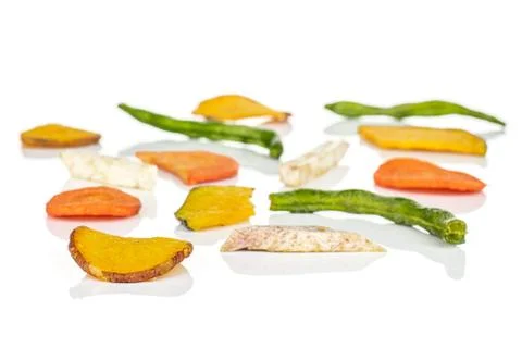 Dried vegetable chips isolated on white Foto stock