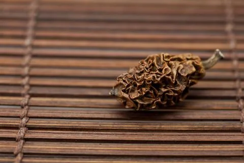 Dried walnut on a bamboo mat Stock-Fotos