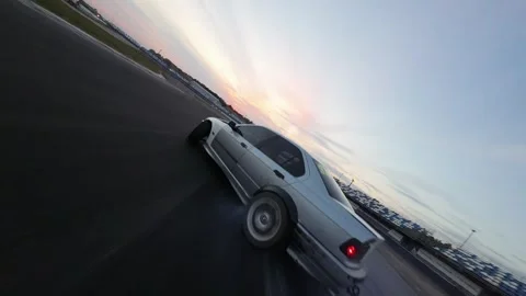 Drift car from FPV drone slow motion Stock Footage 254068761