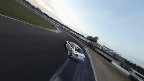 Drift car from FPV drone slow motion Stock Footage 254068791