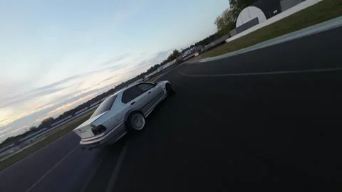 Drift car from FPV drone slow motion Stock Footage 254068809