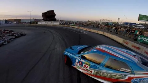 Drift car makes a controlled drift, view from the drone Stock Photos
