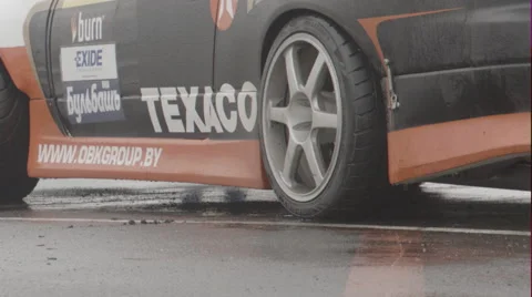 Drift car start in the rain Stock Footage 54391078