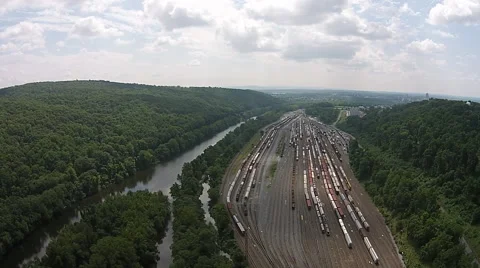 Drift over Rail Yard and River Stock Footage 40683417