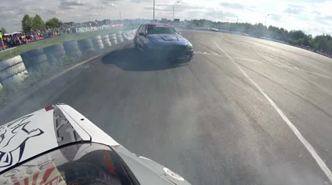 Drift racing outdoors clash Stock Footage 67883591